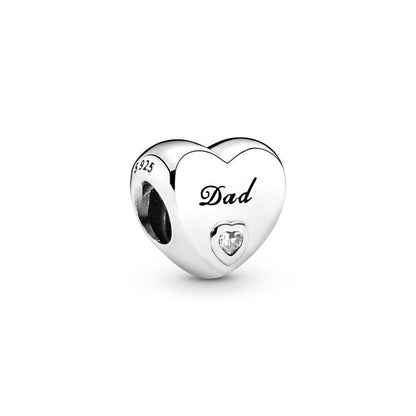 Heart-shaped dad charm with clear gem