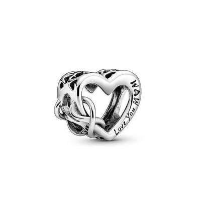 'Love You Mum' heart-shaped charm in sterling silver with engraved text, perfect for bracelets or necklaces. A heartfelt gift for mothers.