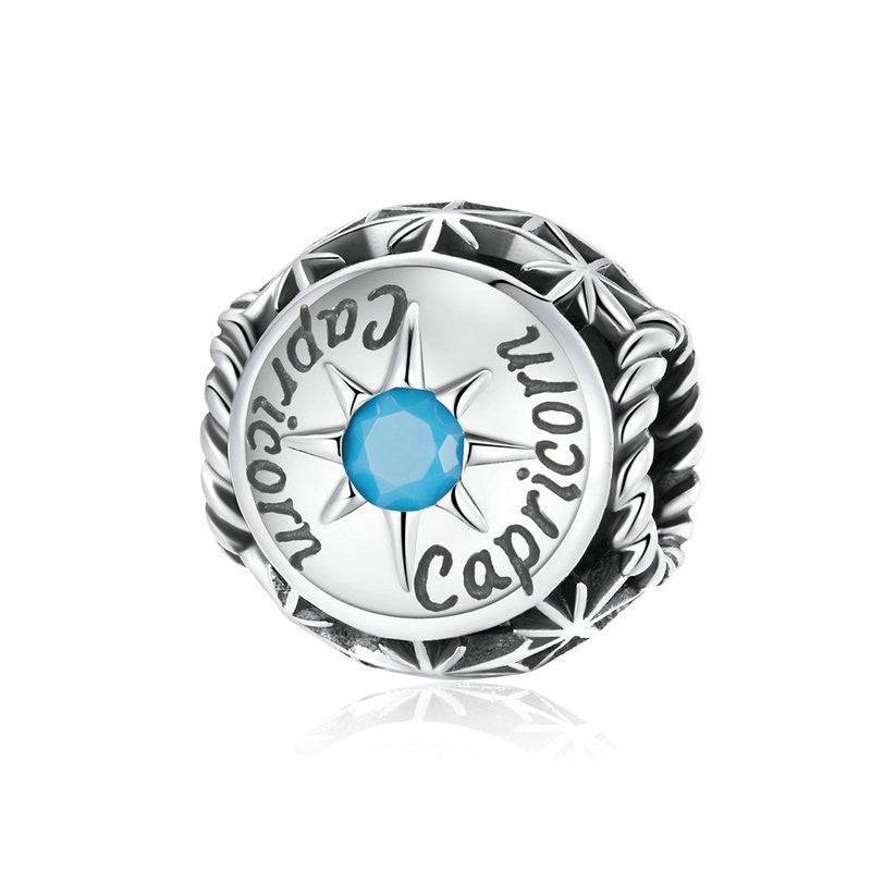 Capricorn zodiac charm with turquoise zircon