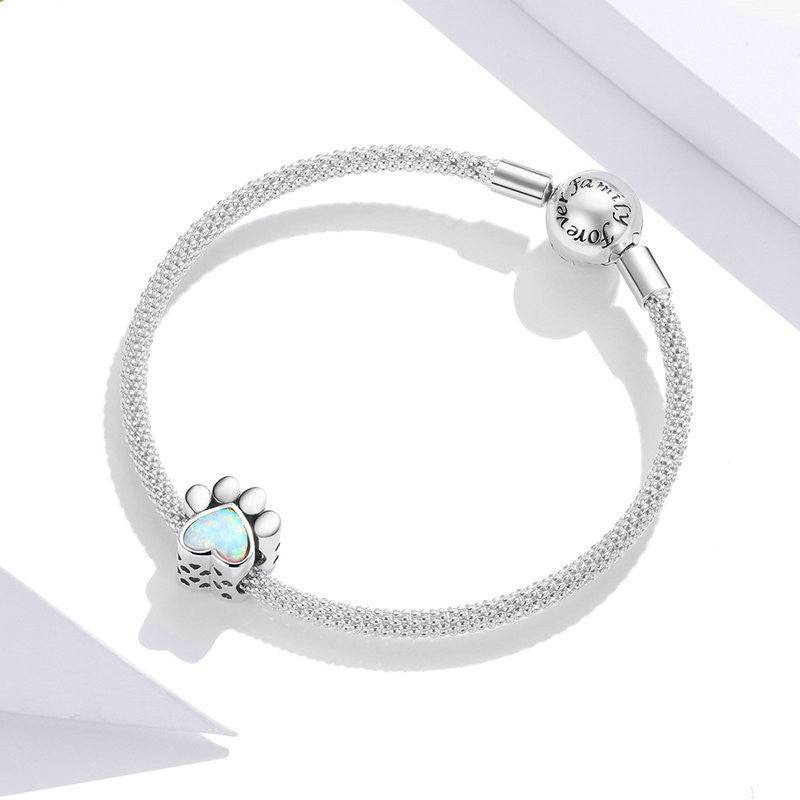 Bracelet with cute dog paw charm and opal heart