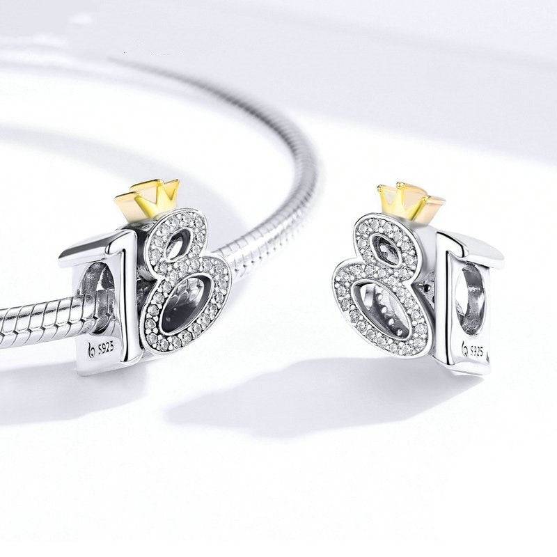 Pair of 18th birthday charms on bracelet