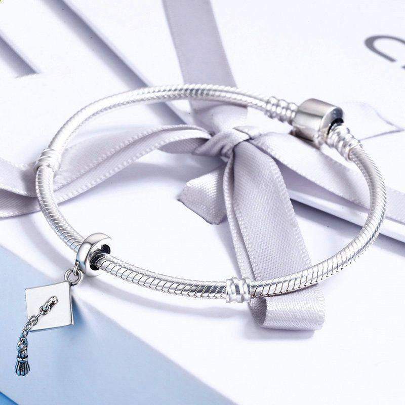 Graduation hat charm on silver bracelet with ribbon