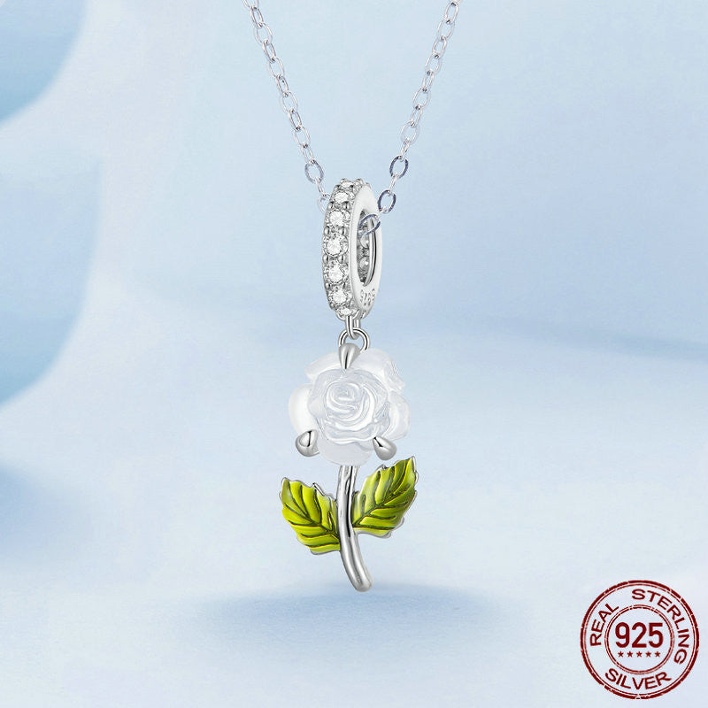 Necklace featuring color-changing rose charm