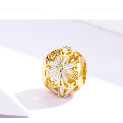 Elegant Gold Daisy Charm with floral pattern