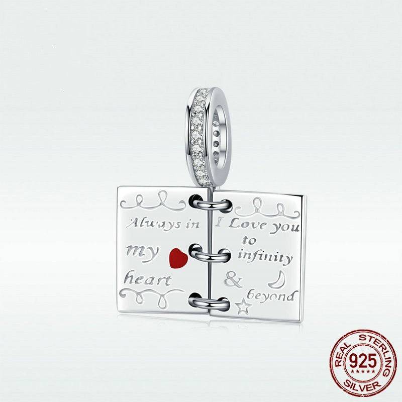 Sterling silver charm with love notes engraving