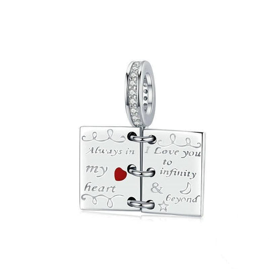 Close-up of love notes charm with heart design