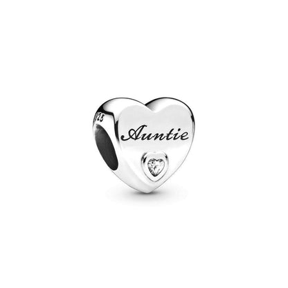 Heart-shaped auntie charm with clear gem