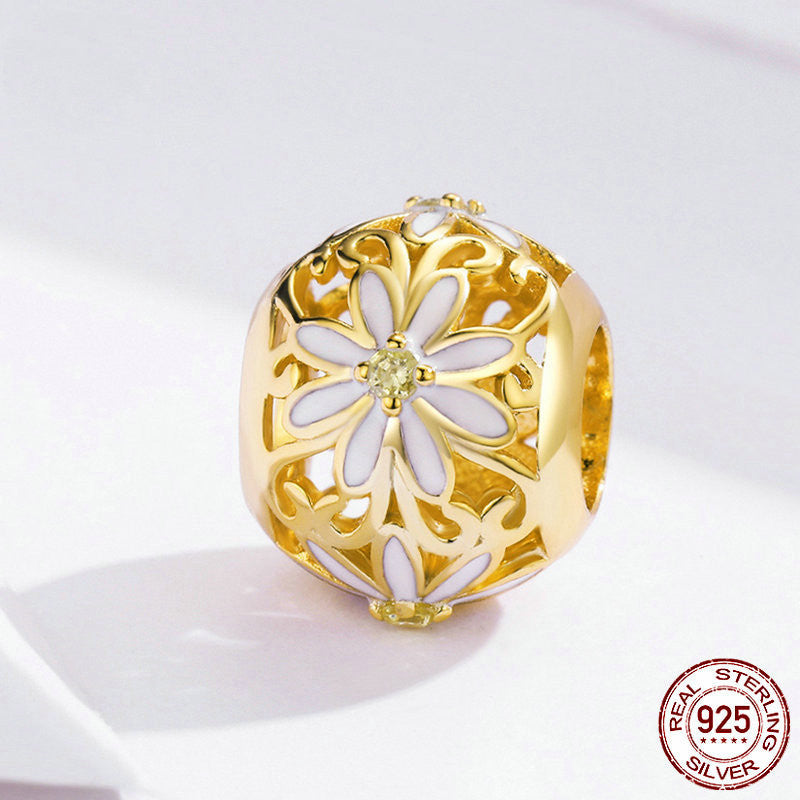 Gold Daisy Charm showcasing floral elegance