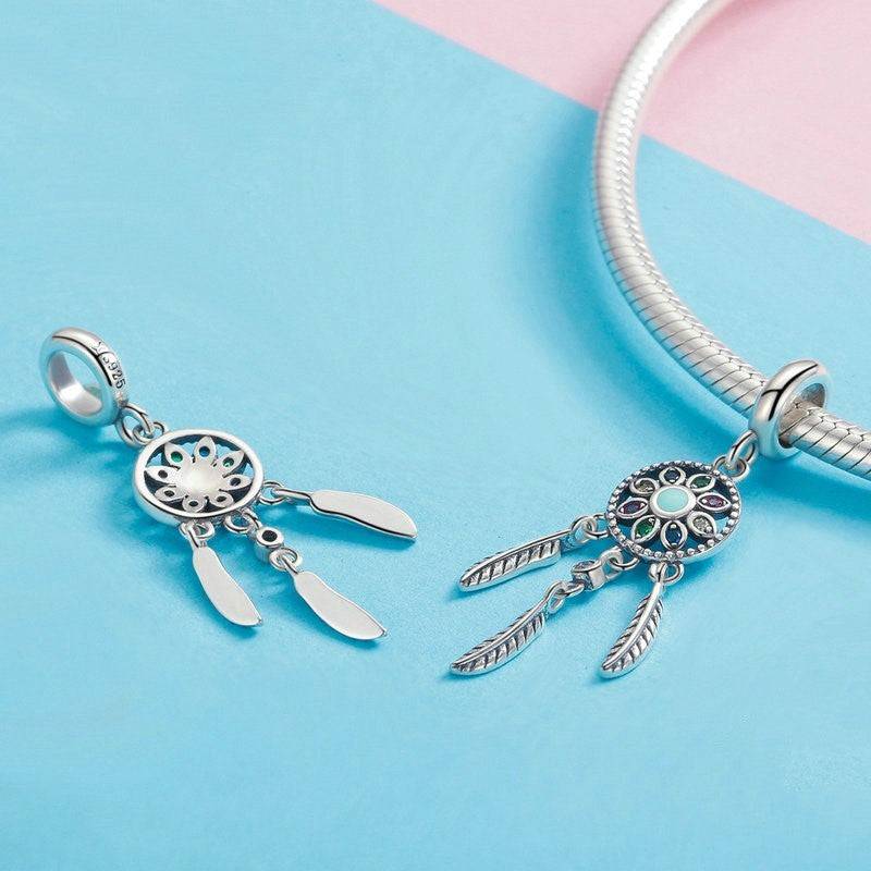 Silver dangle dreamcatcher charms on bracelet