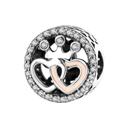 Silver charm with intertwined hearts and crystals