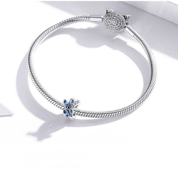 Bracelet featuring butterfly spacer charm